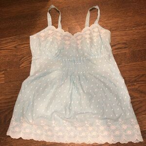 Really cute thick strap tank top. Baby blue with white stitching/ embroidery.